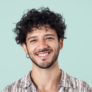 Man with curly hair and earring