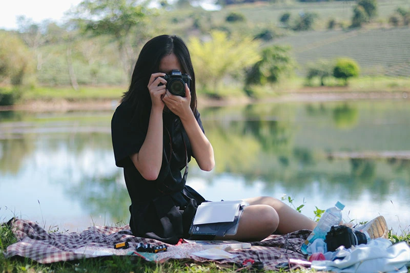 woman taking a picture as a hobby